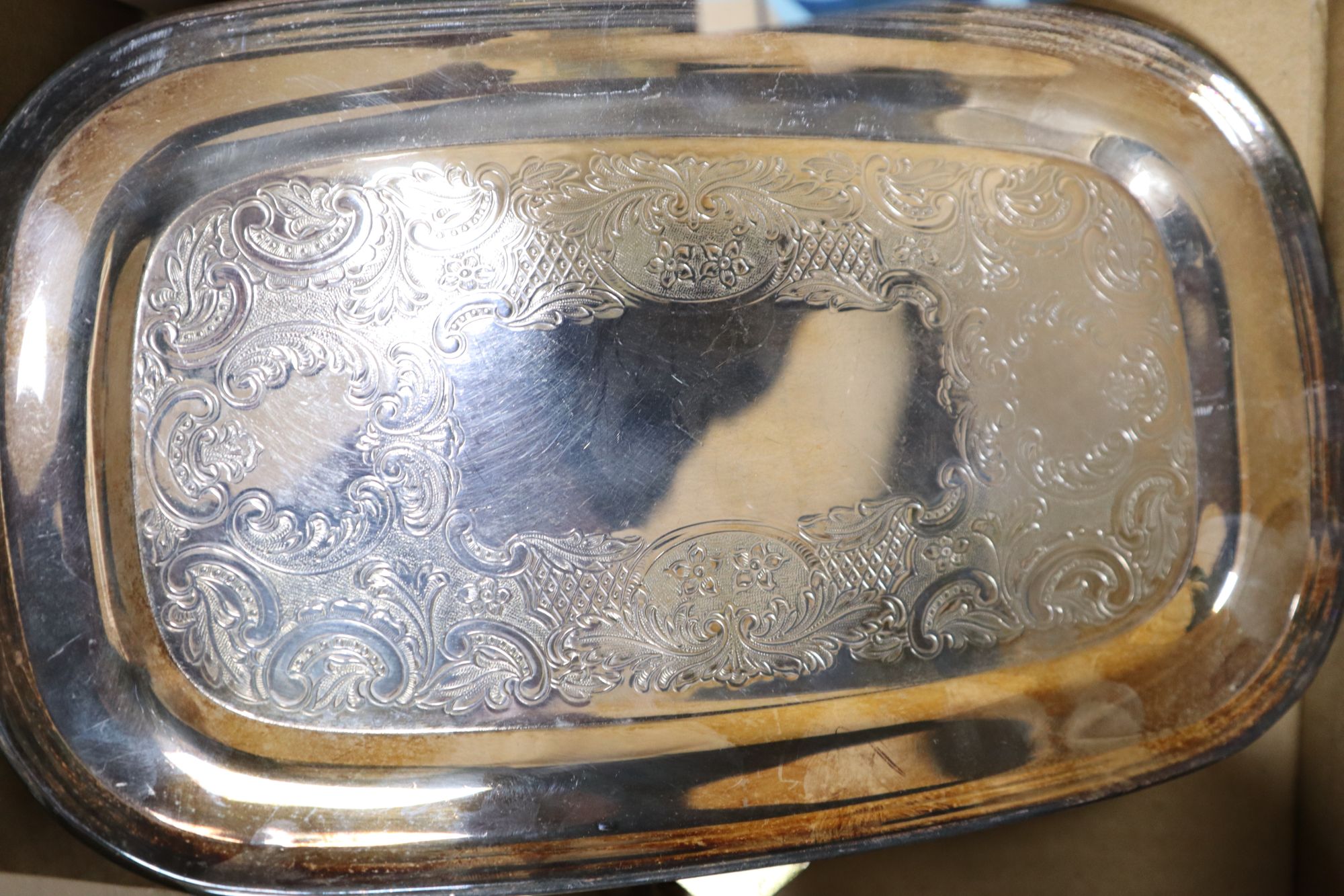 Three enamelled silver spoons (one pair), other spoons, a pair of silver pin trays, a white metal bangle and sundry plated items